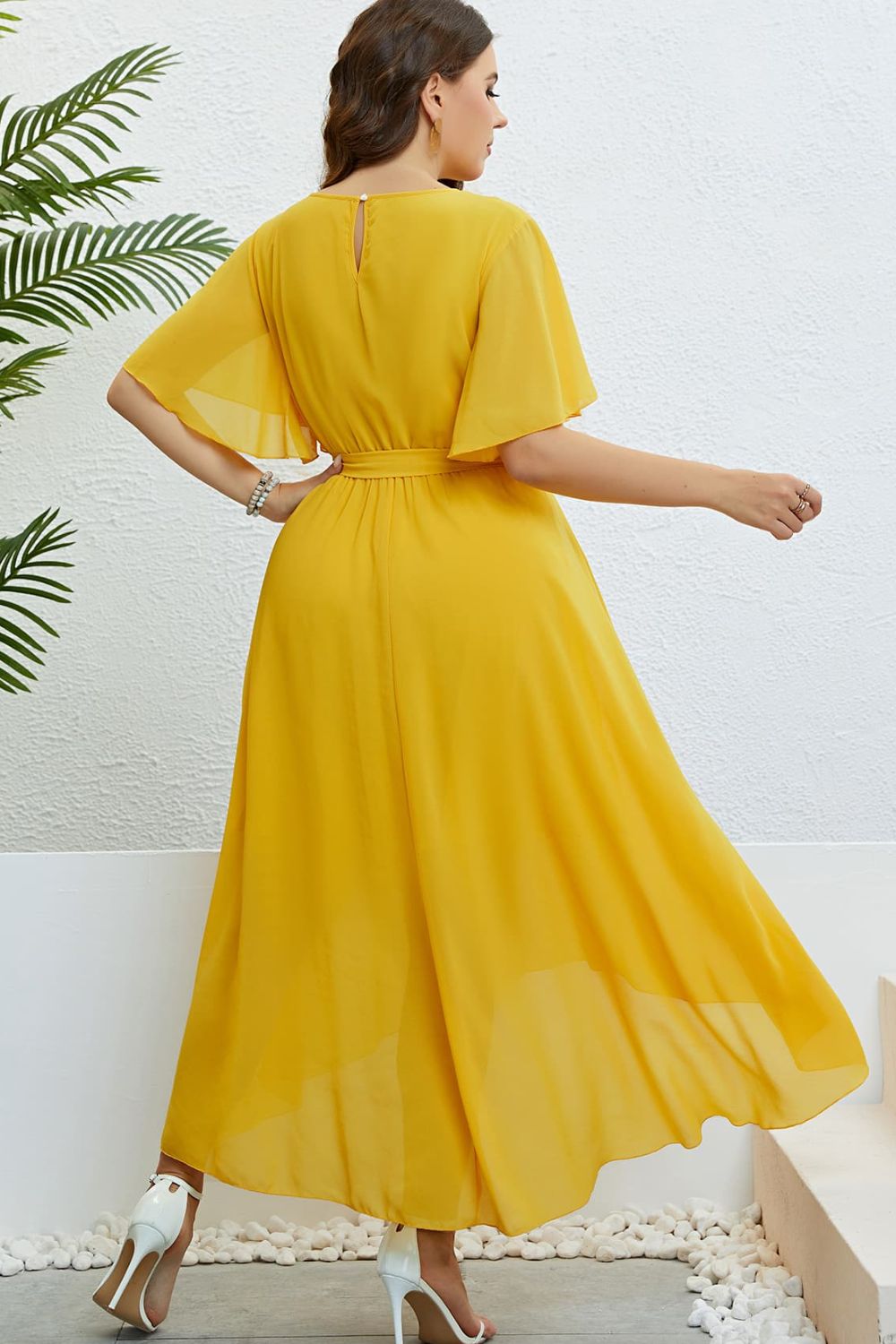 "Belted Flutter Sleeve High-Low Dress - Front View" "Elegant High-Low Dress with Flutter Sleeves" "Women's Fashion - Belted Dress"